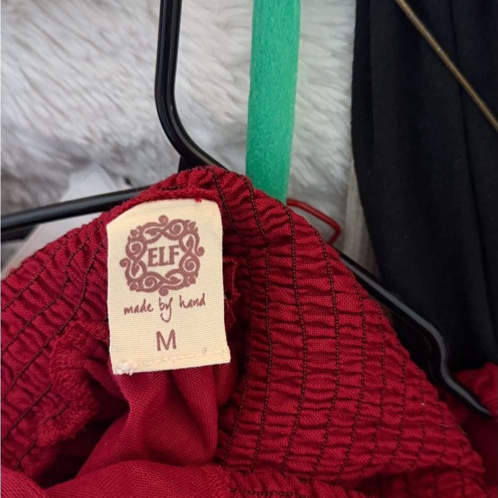 ELF wine red smocked blouse